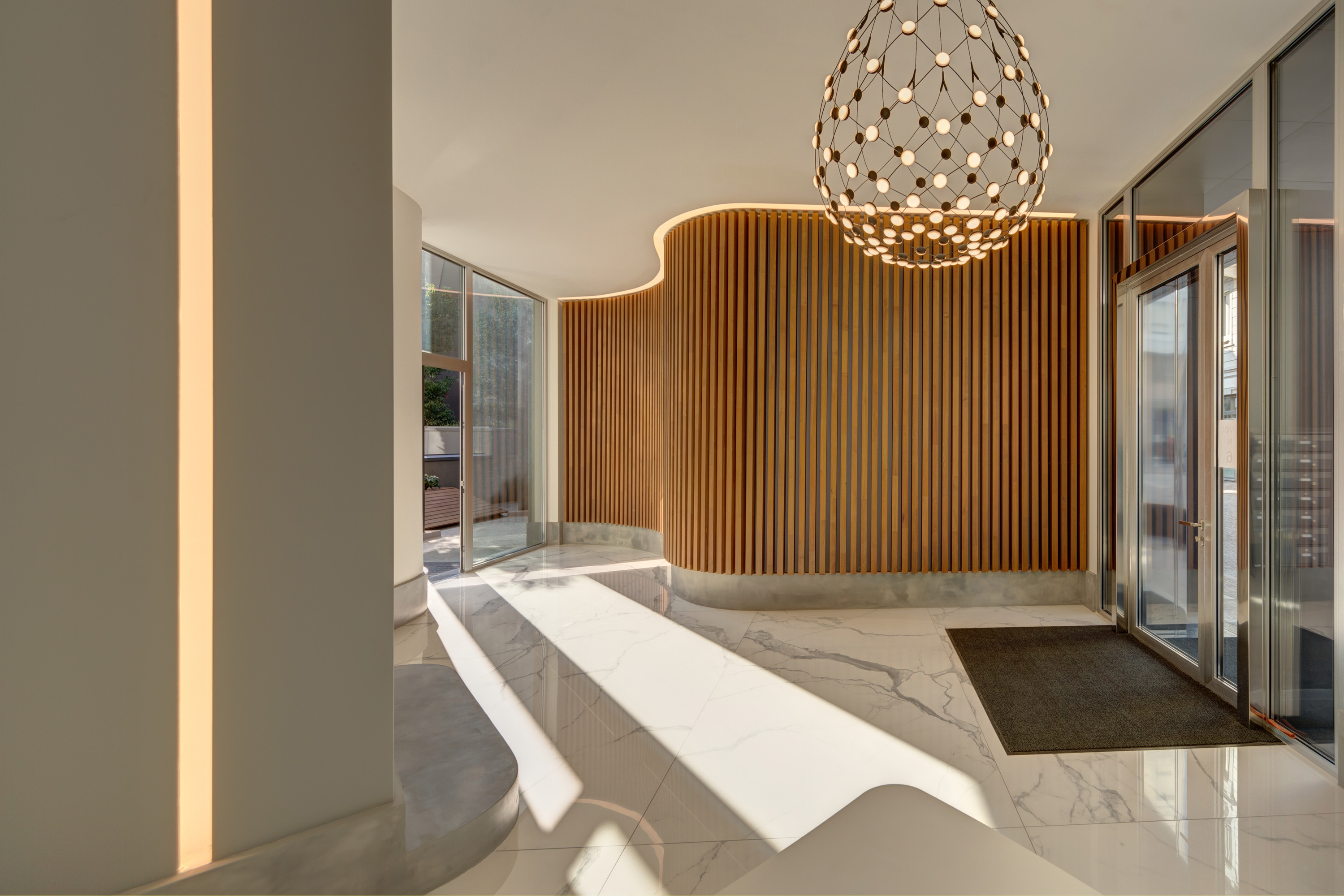 Facciata-in-legno-ingresso-monza