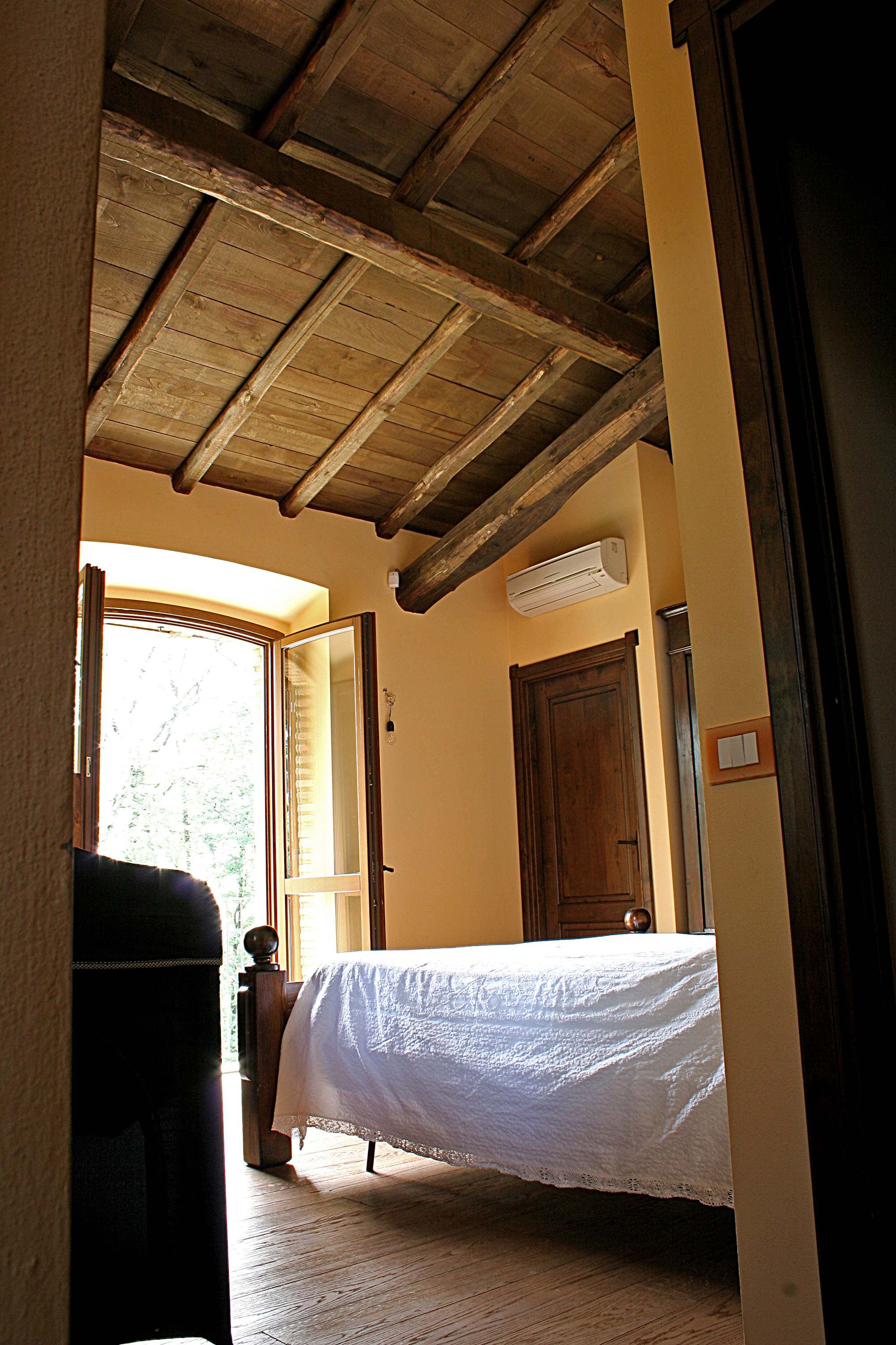 Solaio-in-legno-camera-como